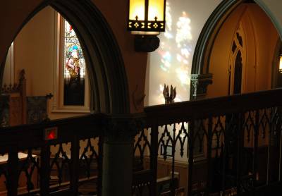 St. George’s Church offers a nice environment for prayer and meditation The sun shines through some of our windows and reflects on the wall