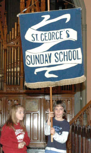A child processing with the banner